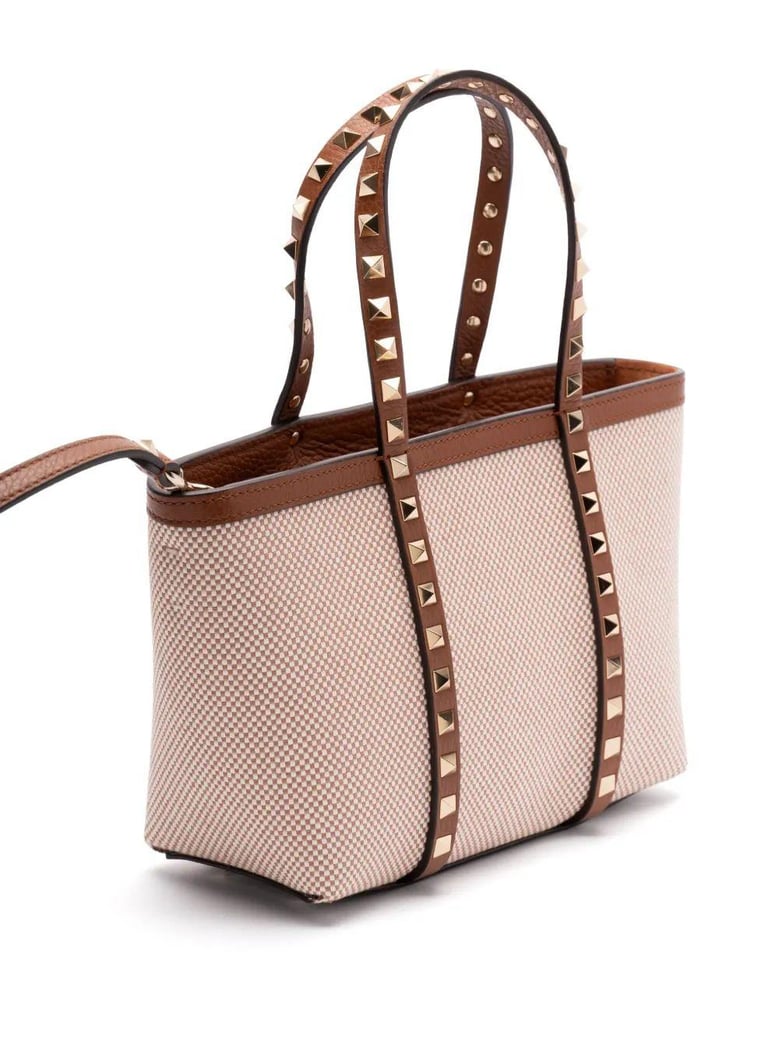 two-tone canvas medium rockstud handbag by Selfnex