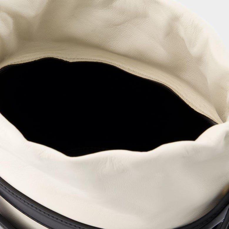 two-tone leather the rise bucket bag by Selfnex