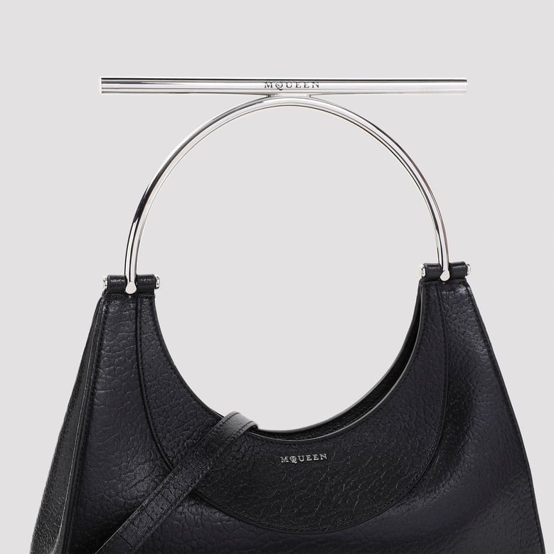 black leather cross-bar handbag by Selfnex