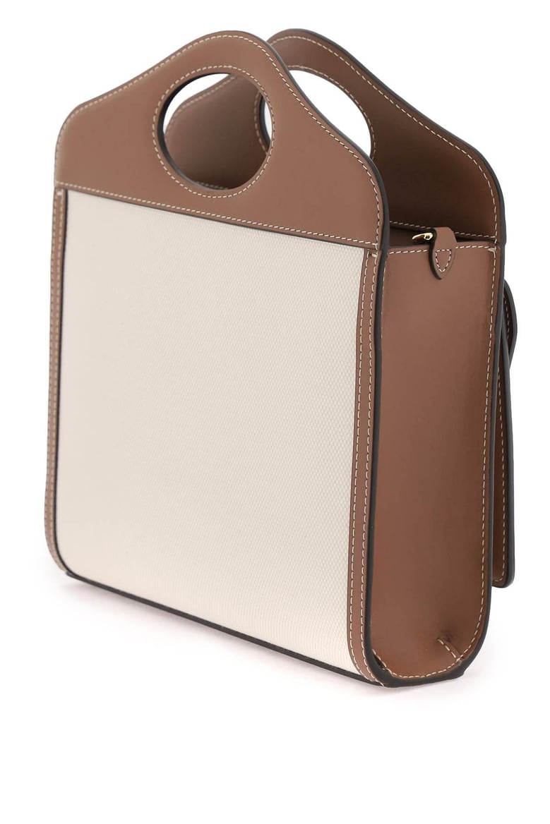 two-tone canvas and leather mini pocket handbag by Selfnex