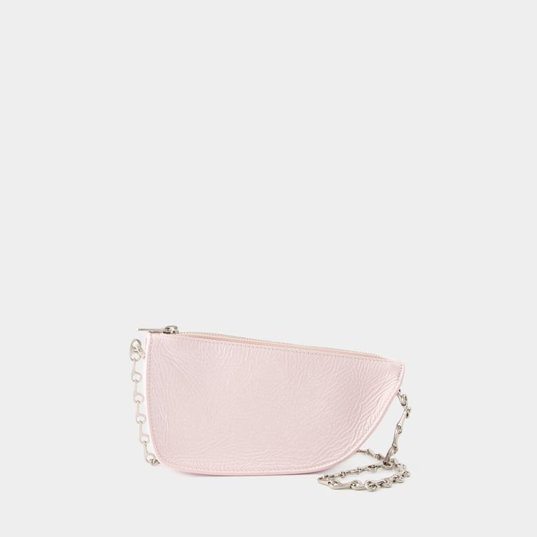 pastel pink leather micro shield shoulder bag by Selfnex