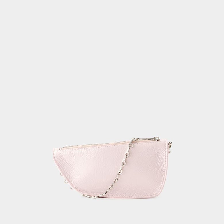 pastel pink leather micro shield shoulder bag by Selfnex