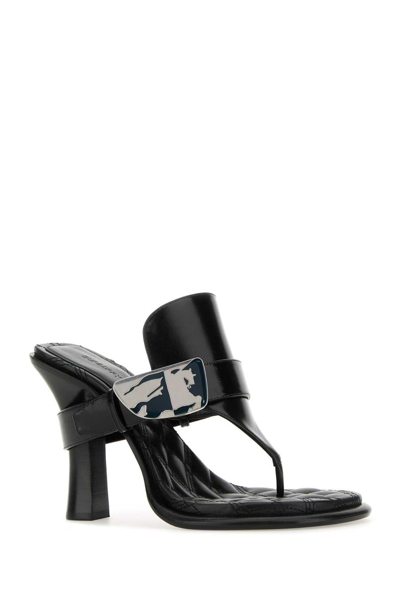 black leather bay thong mules by Selfnex