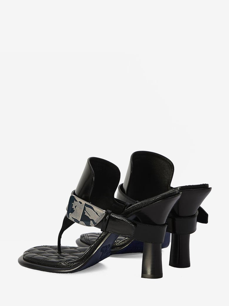 black leather bay thong mules by Selfnex