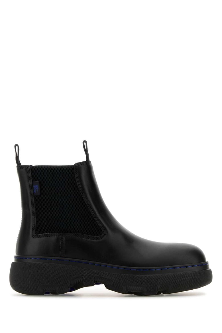 black leather ankle boots by Selfnex