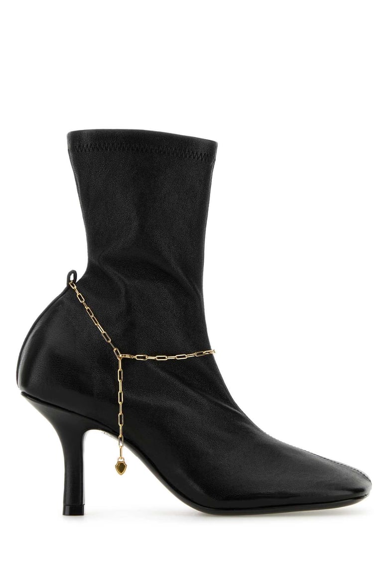 black leather pumps by Selfnex