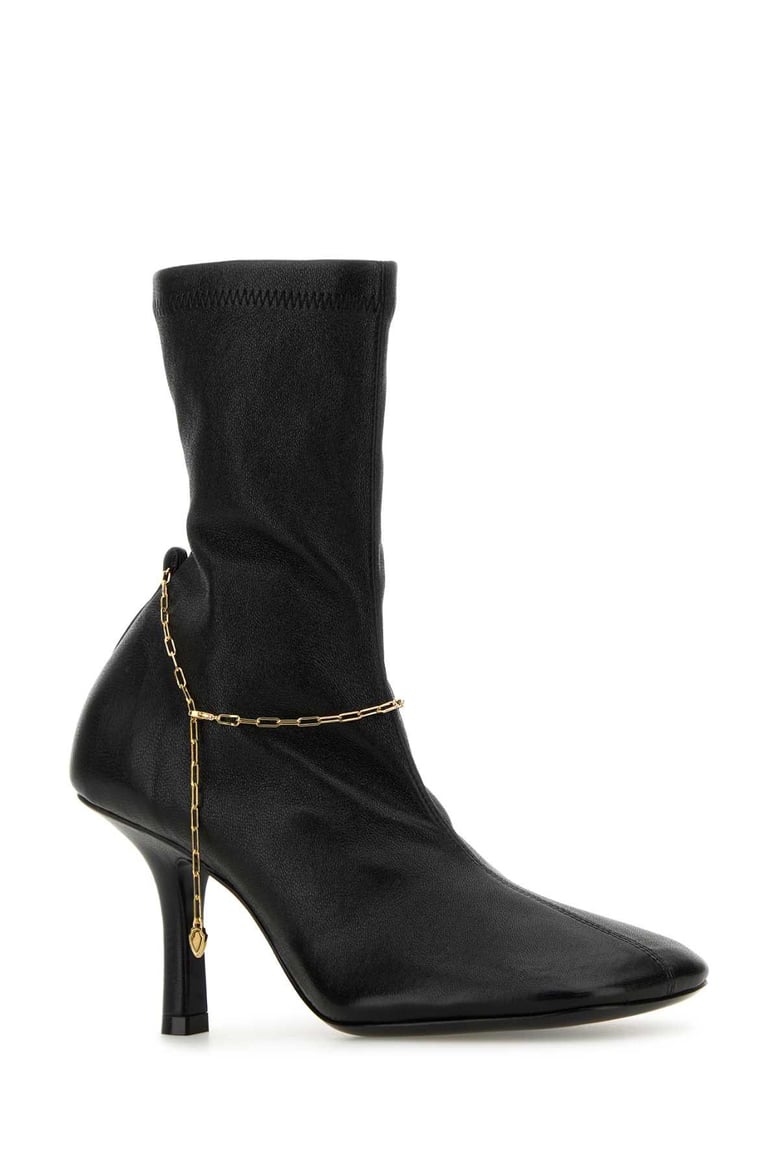 black leather pumps by Selfnex