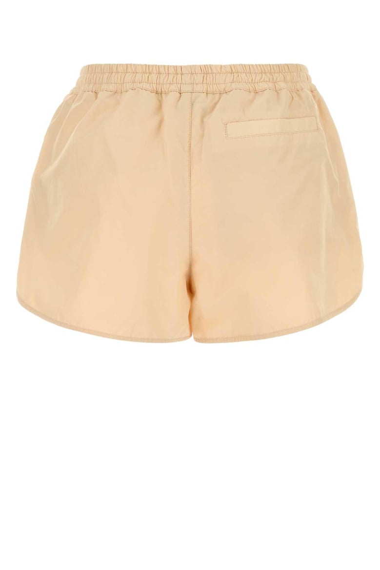 skin pink nylon blend shorts by Selfnex