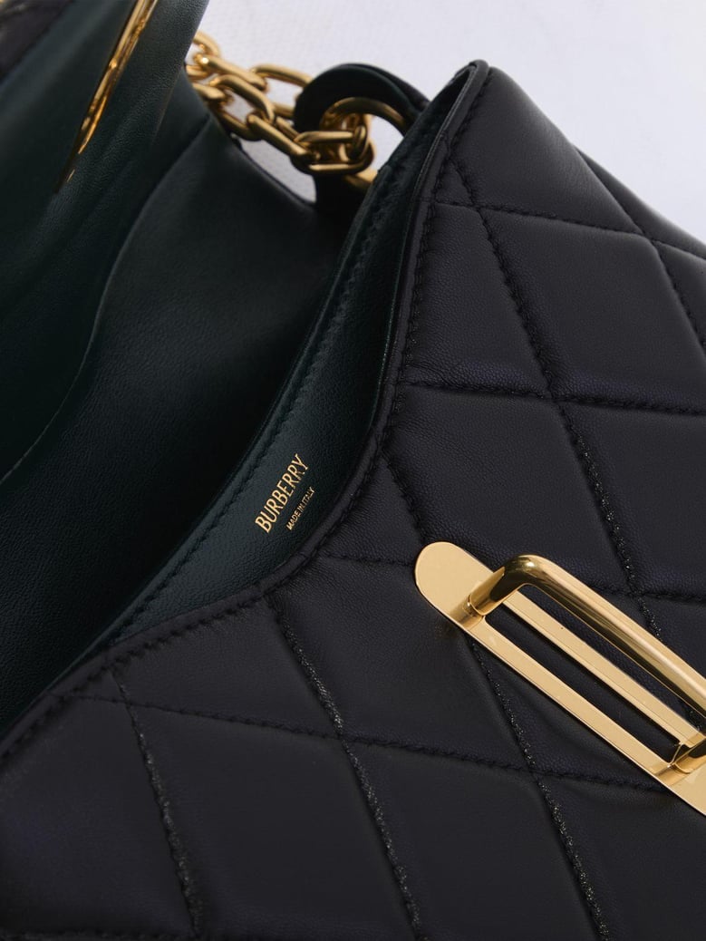 women black leather bag by Selfnex