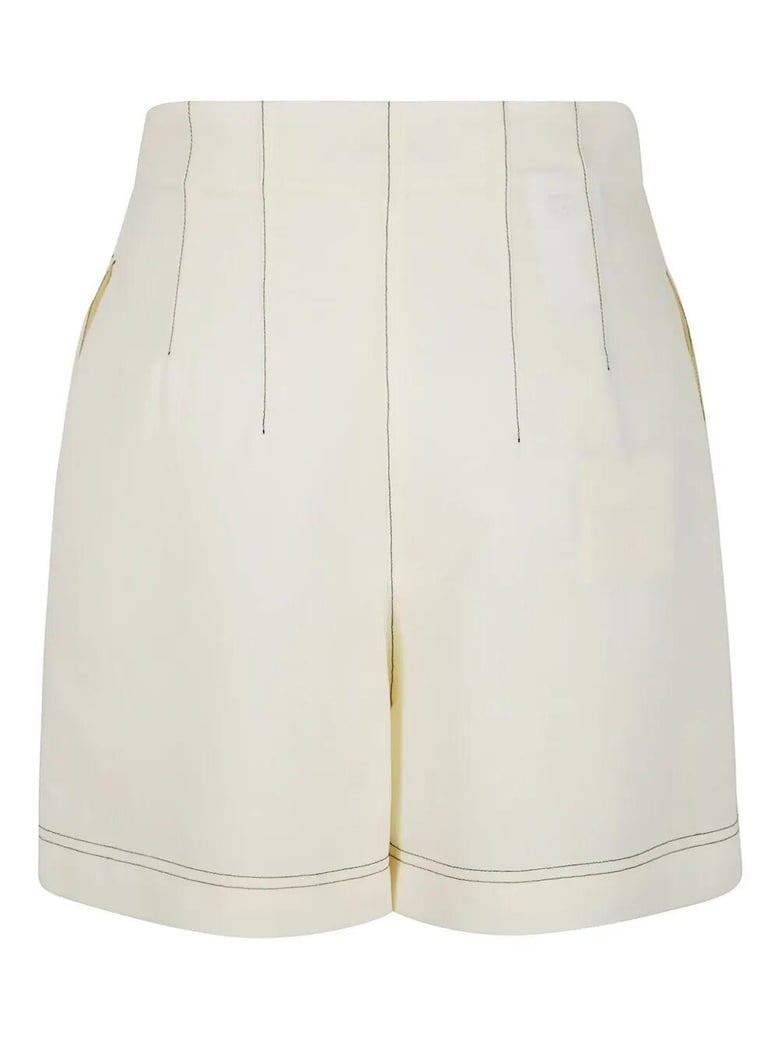 ivory polyester blend pant by Selfnex