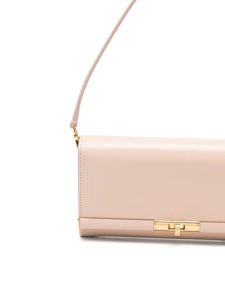 powder pink leather marlene clutch by Selfnex