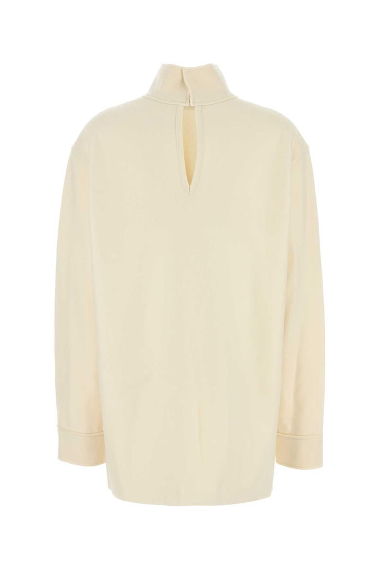 cream wool blend blouse by Selfnex