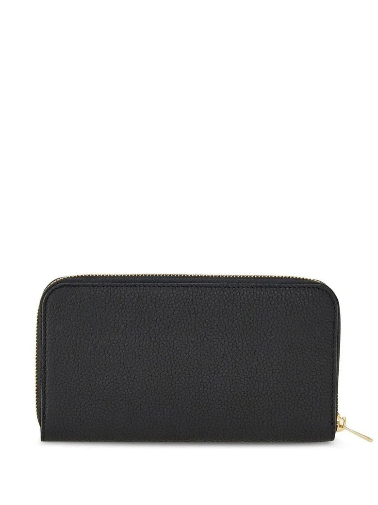 black leather wallet by Selfnex