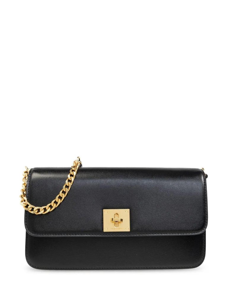 women black leather bag by Selfnex