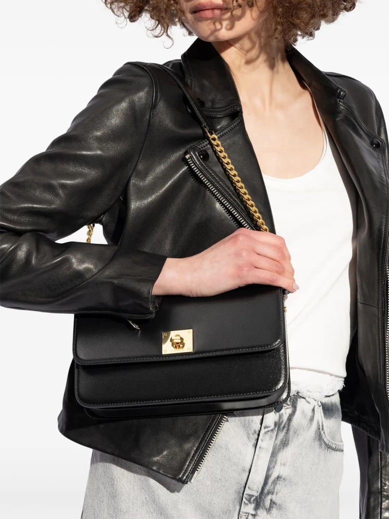 women black leather bag by Selfnex