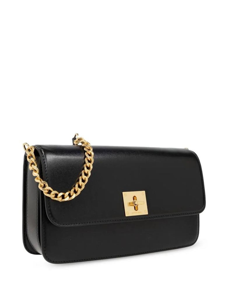 women black leather bag by Selfnex
