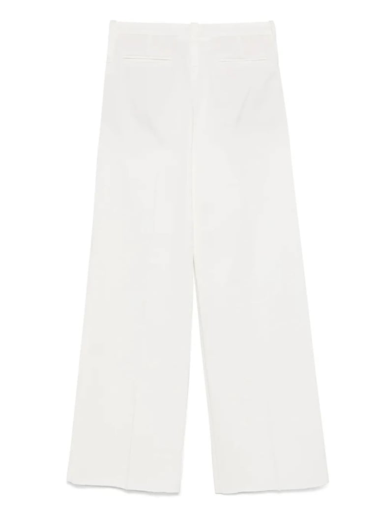 pressed-crease trousers by Selfnex