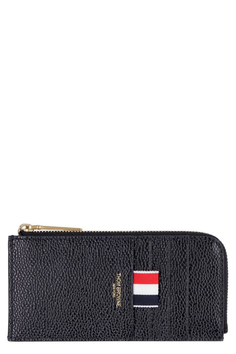 black leather coin purse by Selfnex