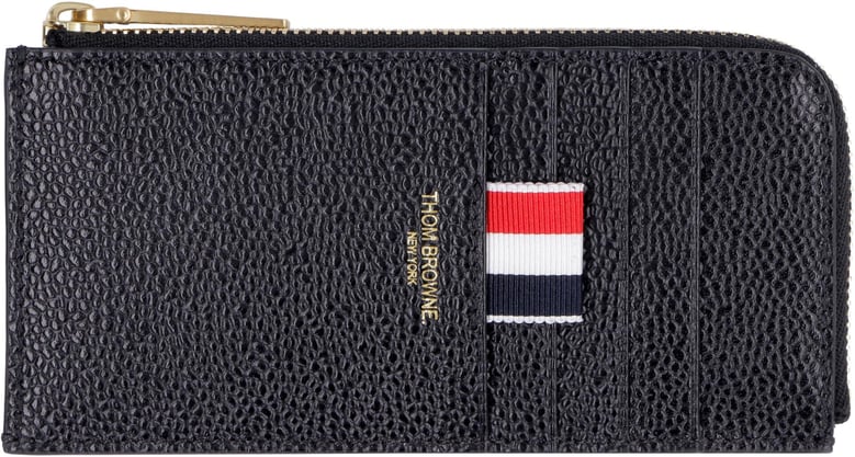 black leather coin purse by Selfnex