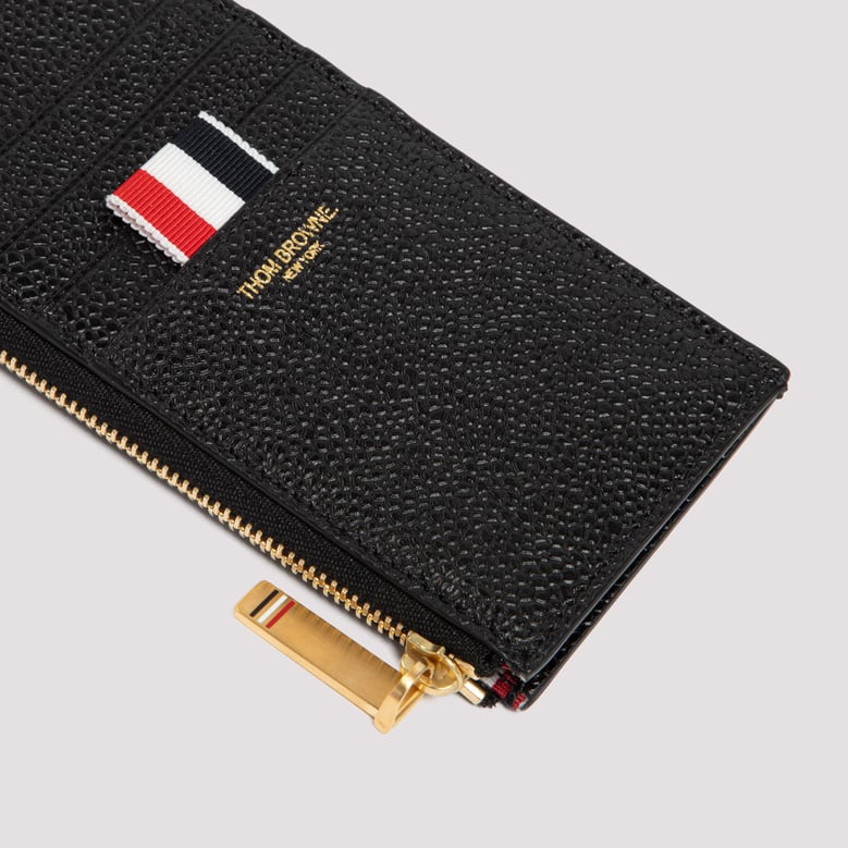 black leather coin purse by Selfnex
