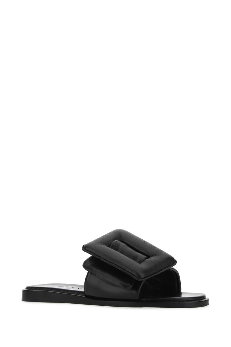 black leather puffy slippers by Selfnex