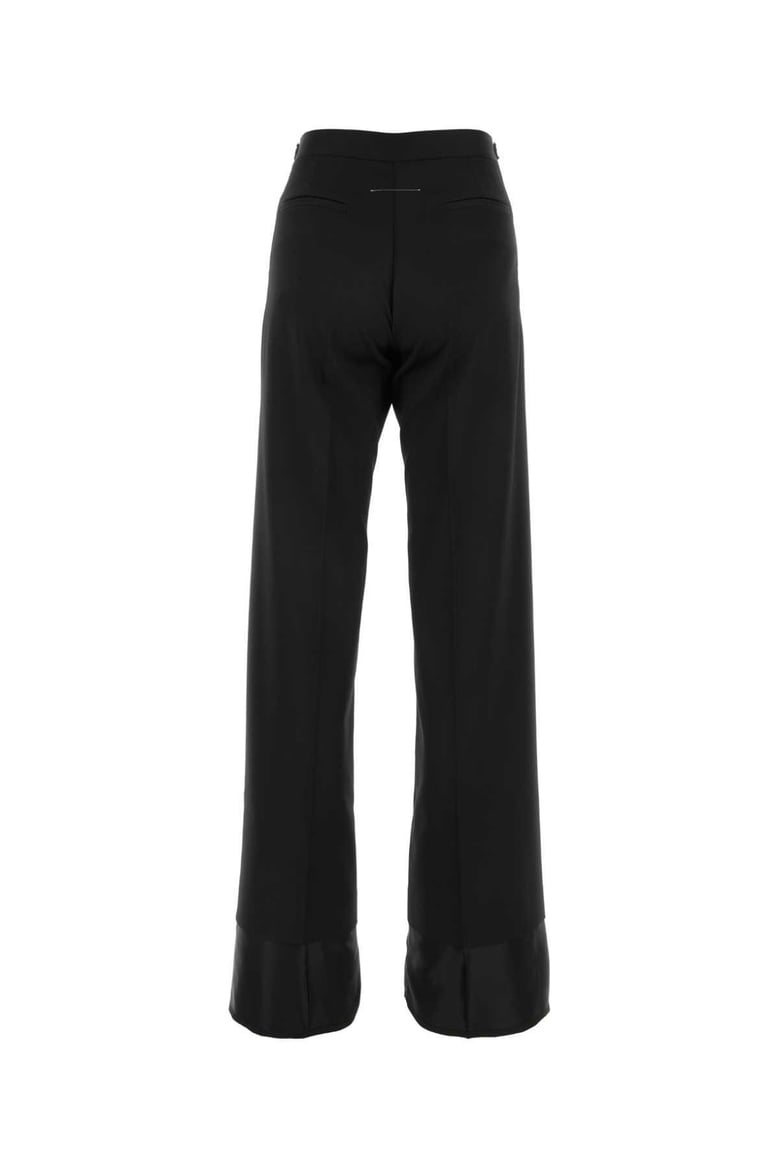 black stretch polyester blend pant by Selfnex