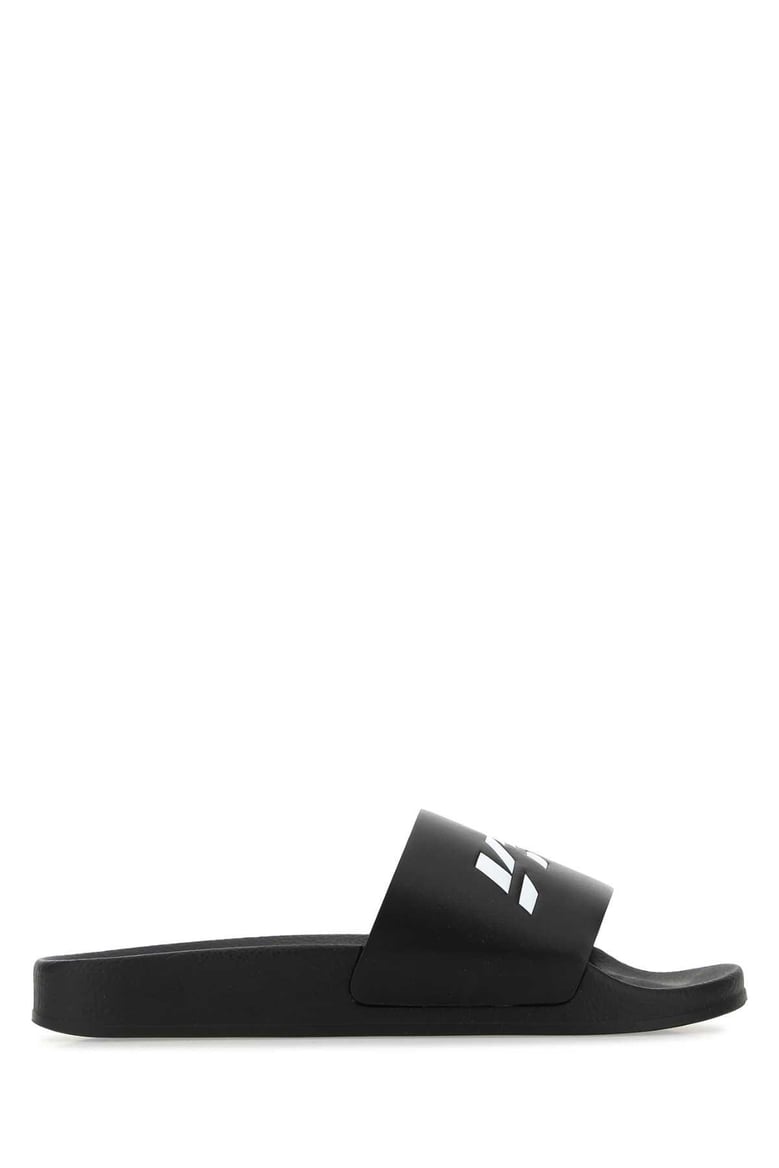 black rubber slippers by Selfnex