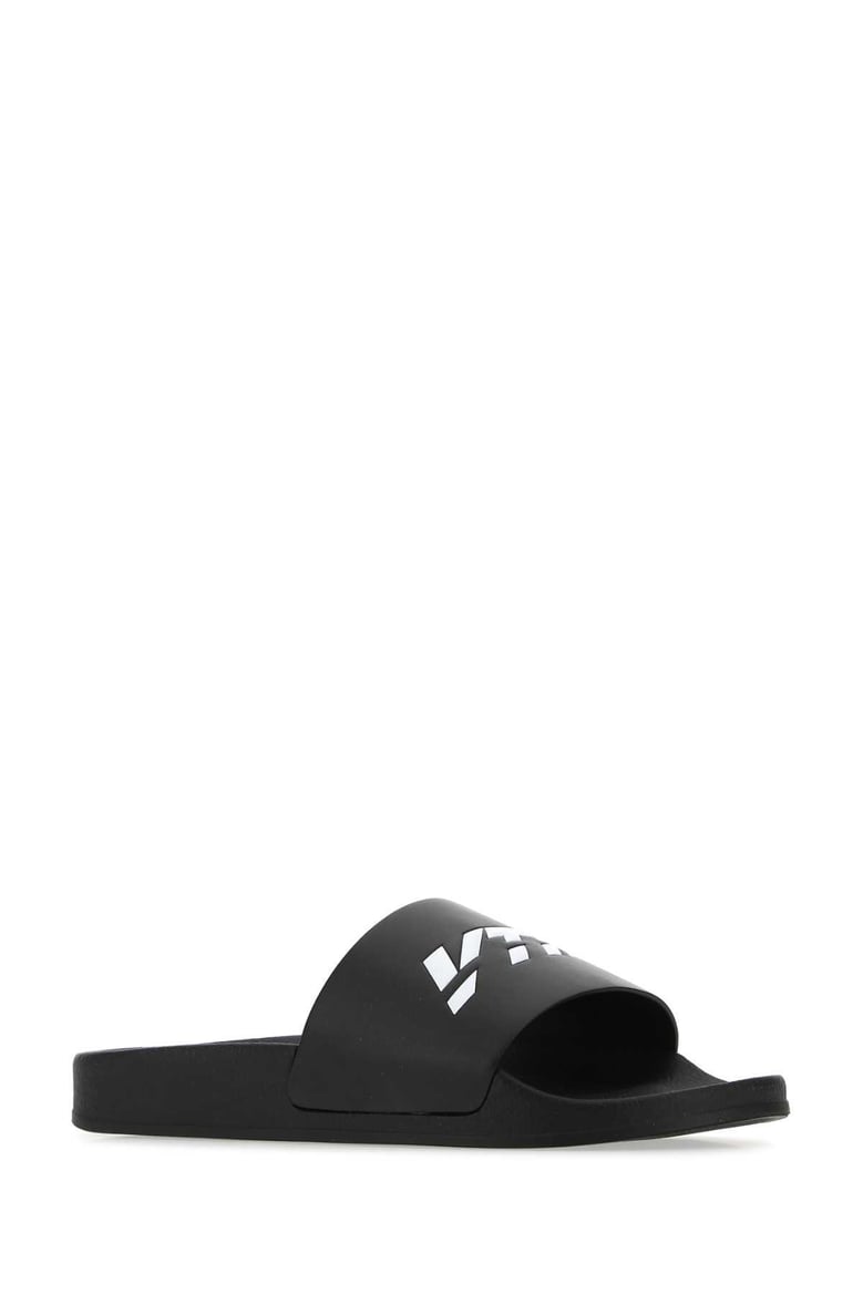black rubber slippers by Selfnex