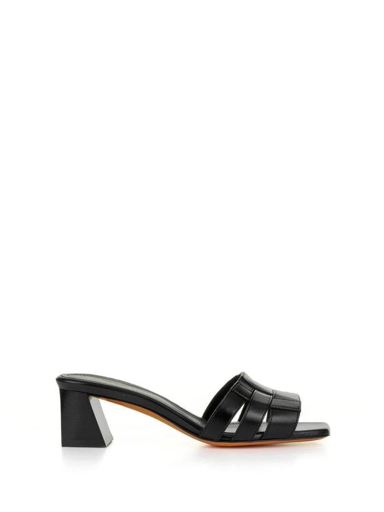 black leather slipper with heel by Selfnex