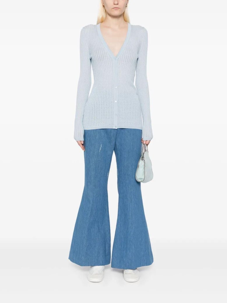blue flared marsh pants by Selfnex