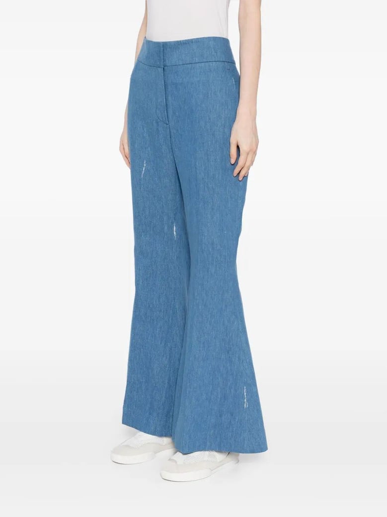 blue flared marsh pants by Selfnex