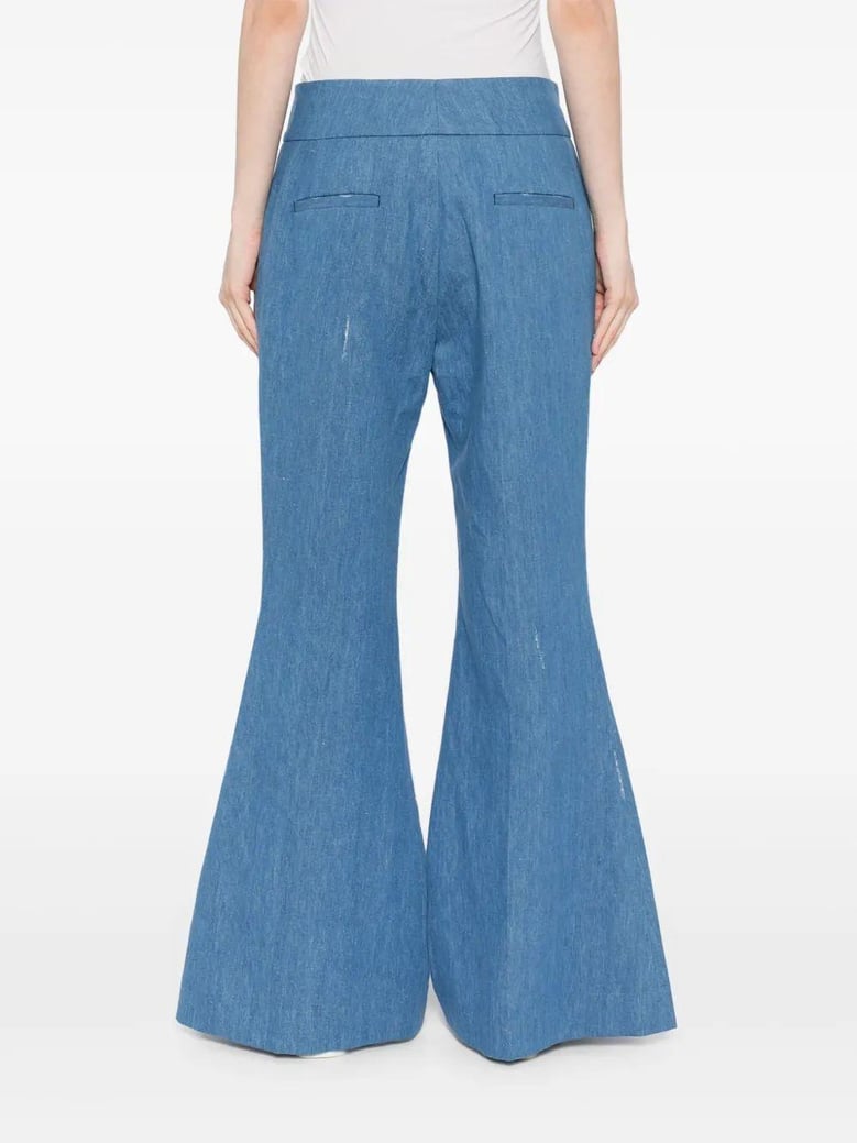 blue flared marsh pants by Selfnex