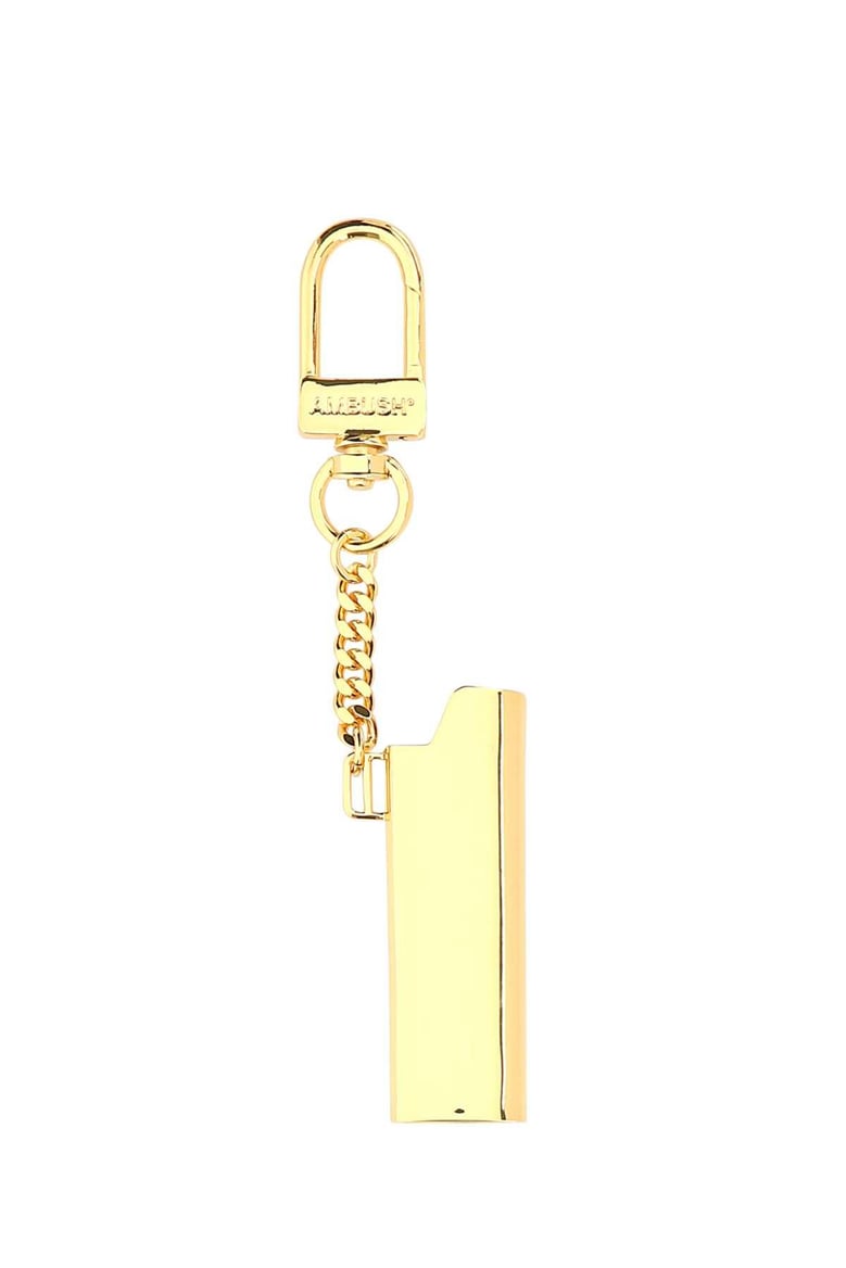 gold metal lighter holder by Selfnex