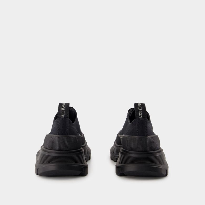 black canvas tread slick sneakers by Selfnex