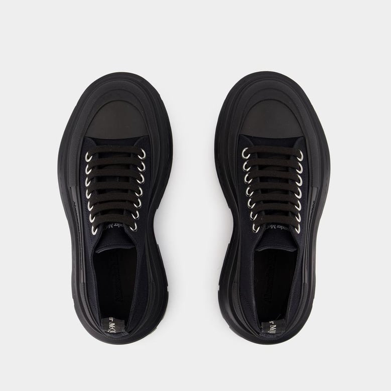 black canvas tread slick sneakers by Selfnex