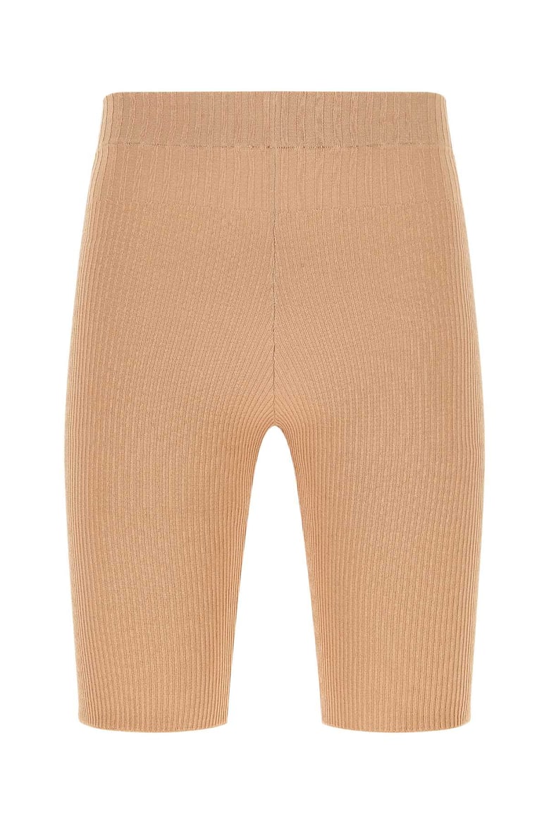 skin pink stretch viscose blend leggings by Selfnex