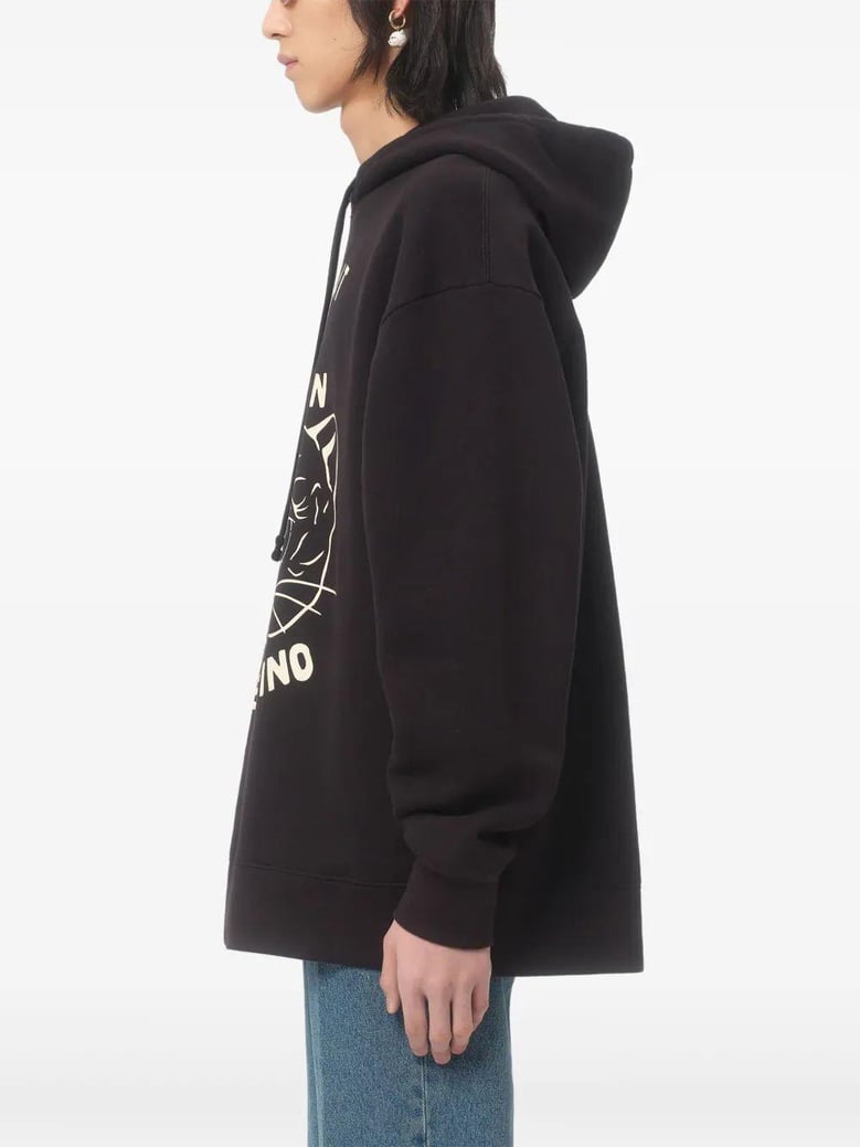 black sweatshirt with le chat de la maison patch by Selfnex