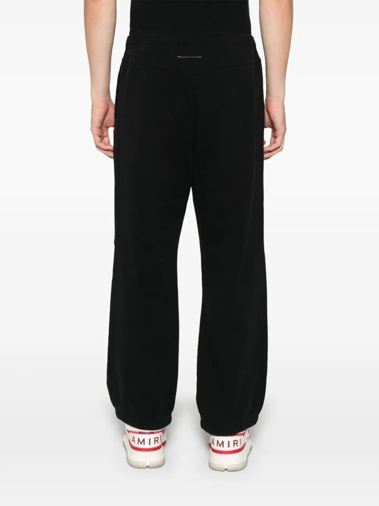 black print cotton trousers by Selfnex