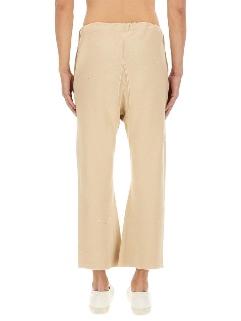 ivory cotton trousers by Selfnex