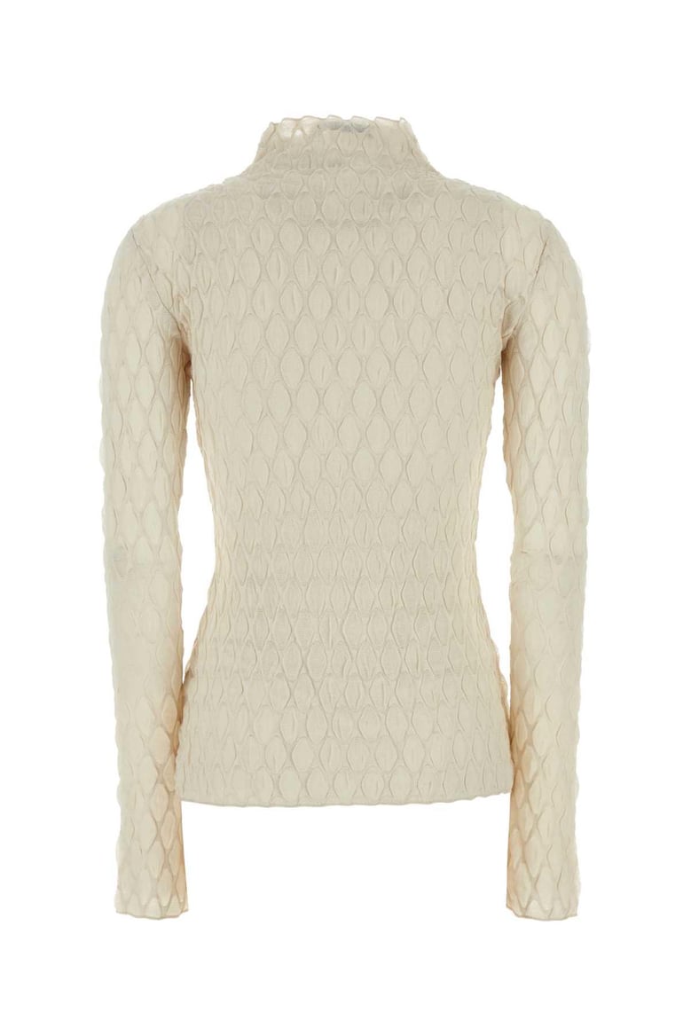 ivory stretch polyester sissil top by Selfnex