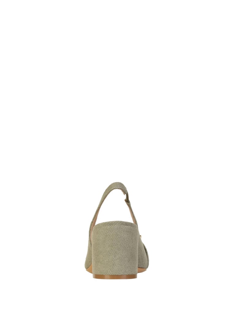 chanel slingback in khaki jeans with wooden accessory by Selfnex