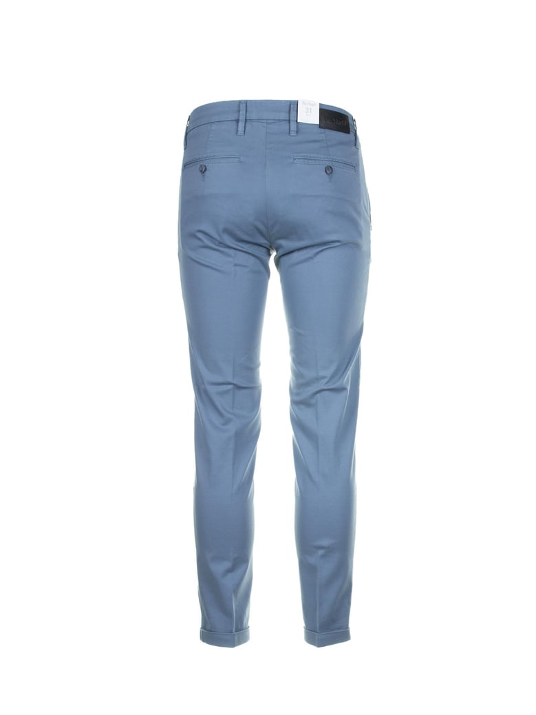 light blue chino trousers by Selfnex