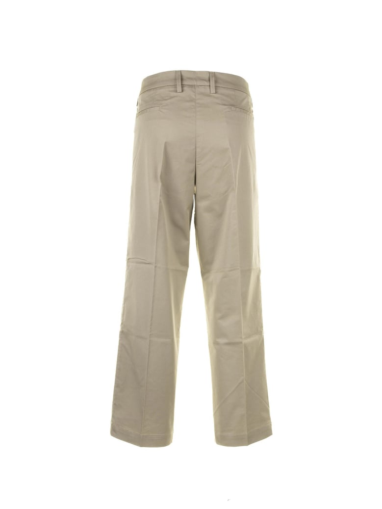 beige high-waisted chino trousers by Selfnex