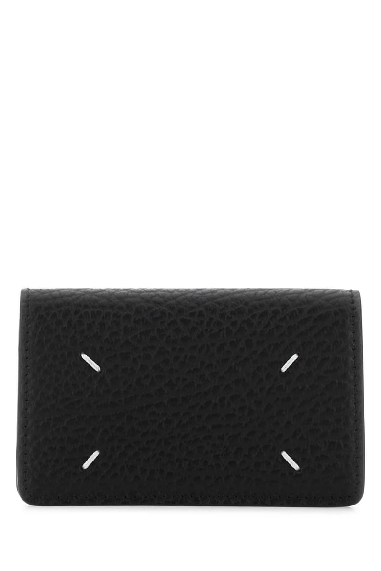 black leather coin purse by Selfnex