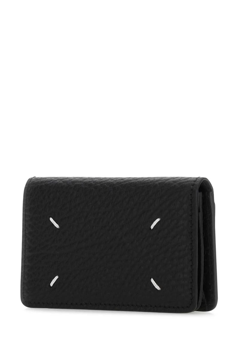 black leather coin purse by Selfnex