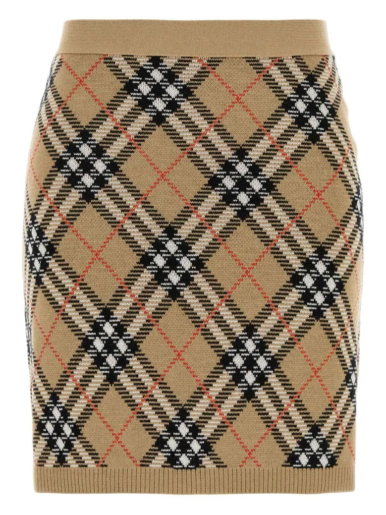 check knit mini skirt by Selfnex