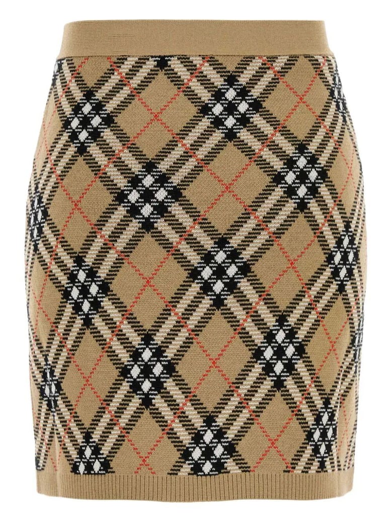 check knit mini skirt by Selfnex
