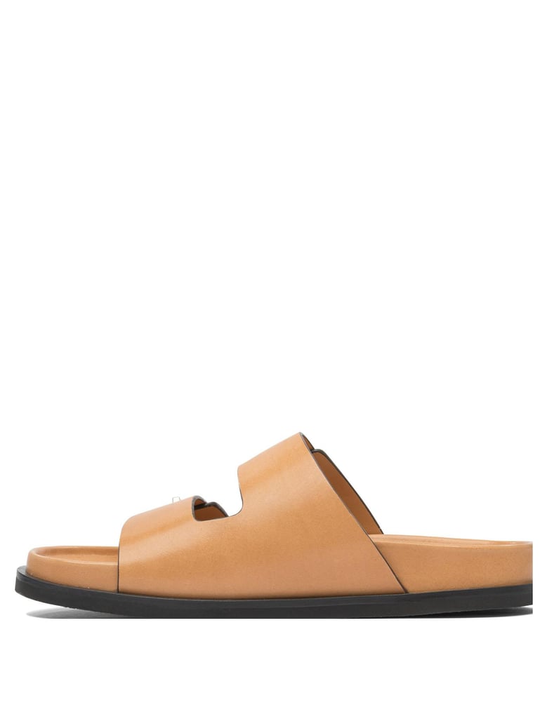 beige rubber sandals by Selfnex