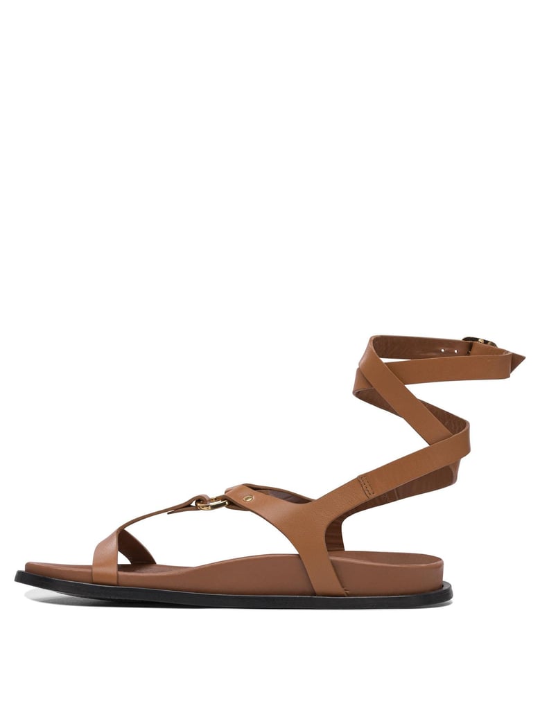 beige cuerolite sandals by Selfnex