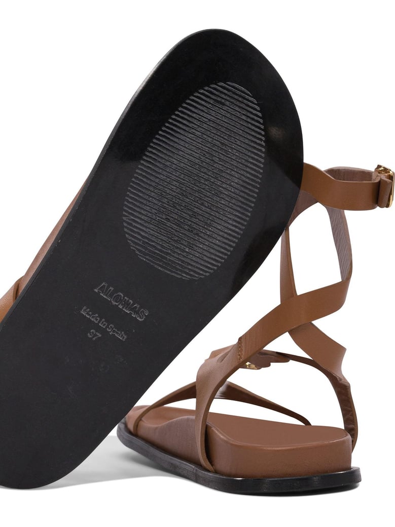 beige cuerolite sandals by Selfnex